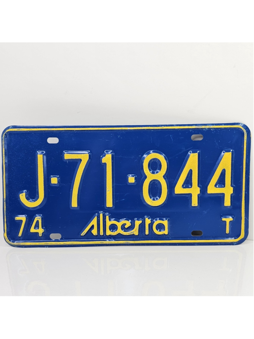 Vintage 1974 Alberta License Plate J-71-844 Blue Yellow Embossed Canada Original